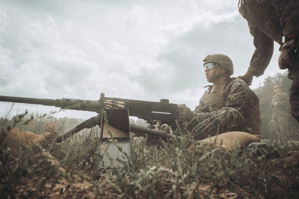 U.S. Marines with Security Battalion, Marine Corps Base Quantico, participate in a machine gun range