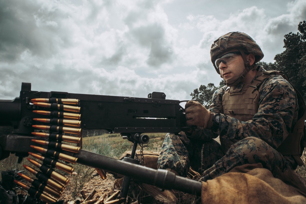 U.S. Marines with Security Battalion, Marine Corps Base Quantico, participate in a machine gun range