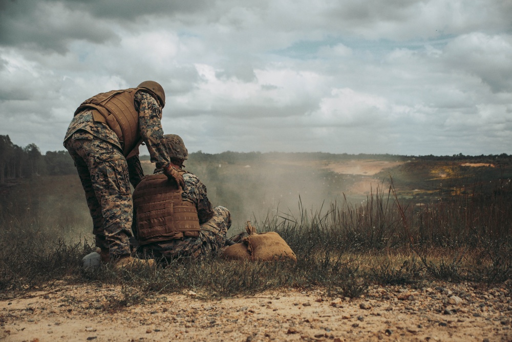 U.S. Marines with Security Battalion, Marine Corps Base Quantico, participate in a machine gun range