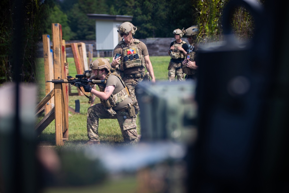 Alabama National Guard Special Forces Soldiers conduct barrier and shoot house training