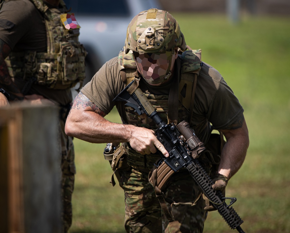 Alabama National Guard Special Forces Soldiers conduct barrier and shoot house training