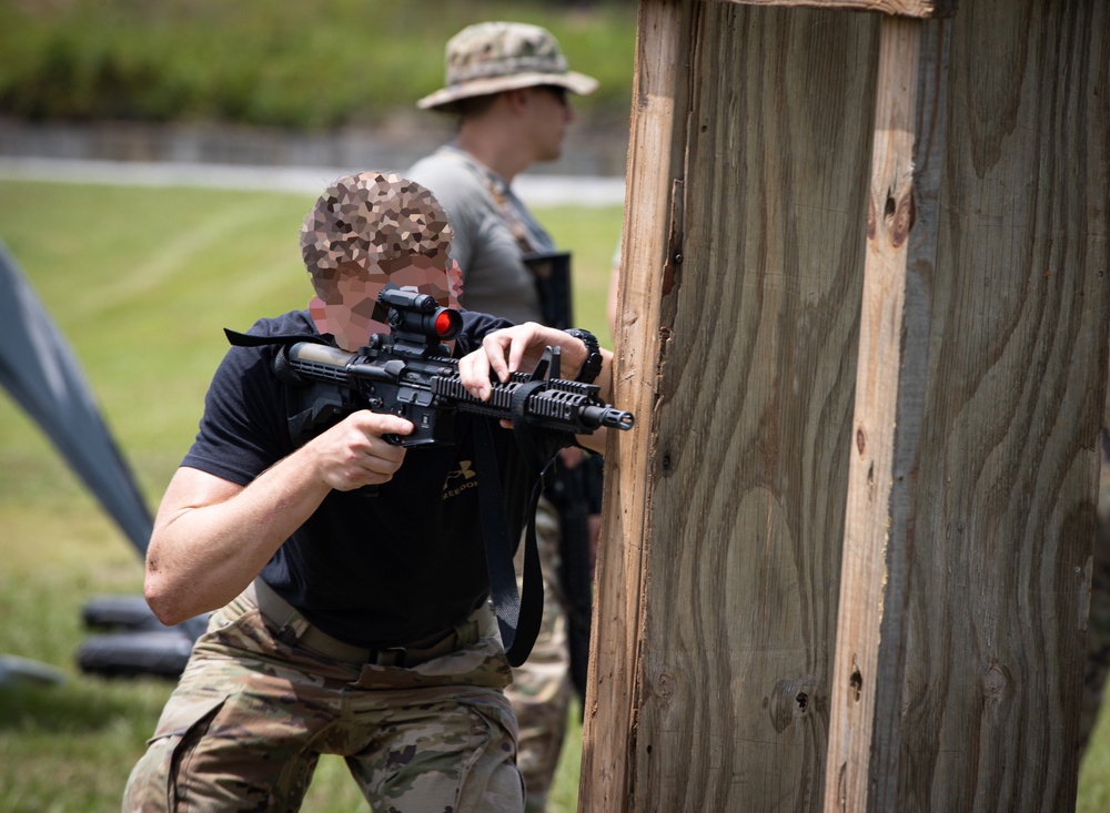 Alabama National Guard Special Forces Soldiers conduct barrier and shoot house training