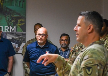 AMLC staff listens to Col. Welde