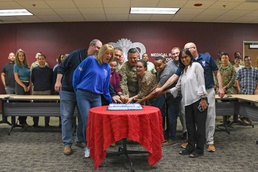 AMLC cake cutting to celebrate five years
