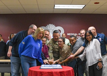 AMLC cake cutting to celebrate five years