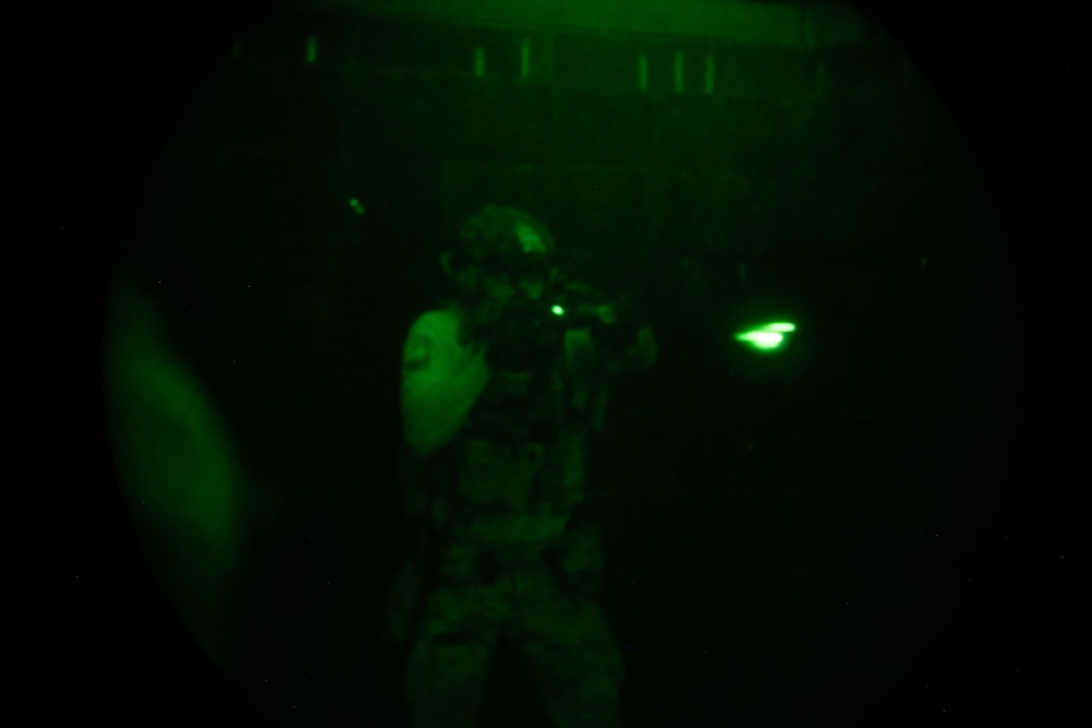 Green Beret clears room during CQB training