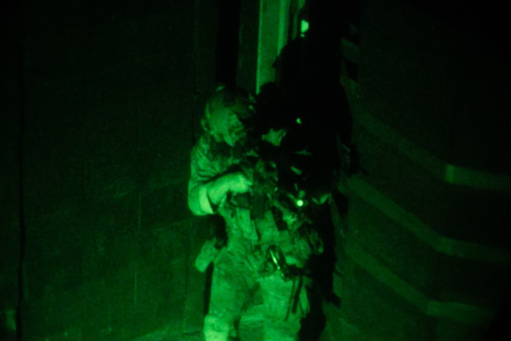 Green Beret clears room during CQB training