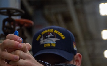 USS Ronald Reagan (CVN 76) Sailors conduct maintenance