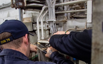 USS Ronald Reagan (CVN 76) Sailors conduct maintenance