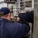 USS Ronald Reagan (CVN 76) Sailors conduct maintenance