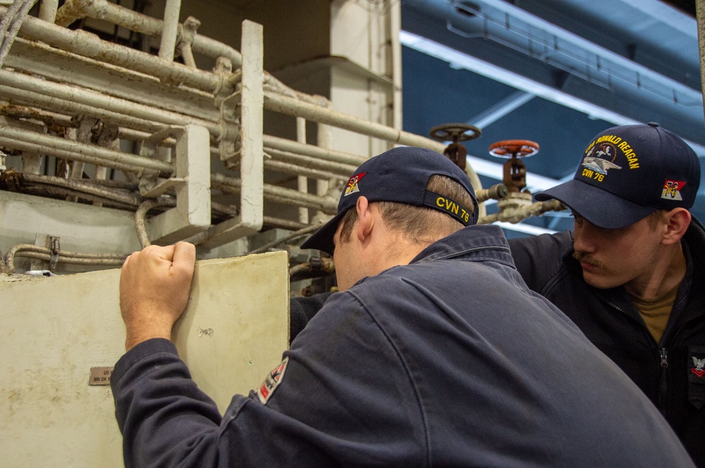 USS Ronald Reagan (CVN 76) Sailors conduct maintenance