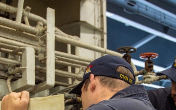 USS Ronald Reagan (CVN 76) Sailors conduct maintenance