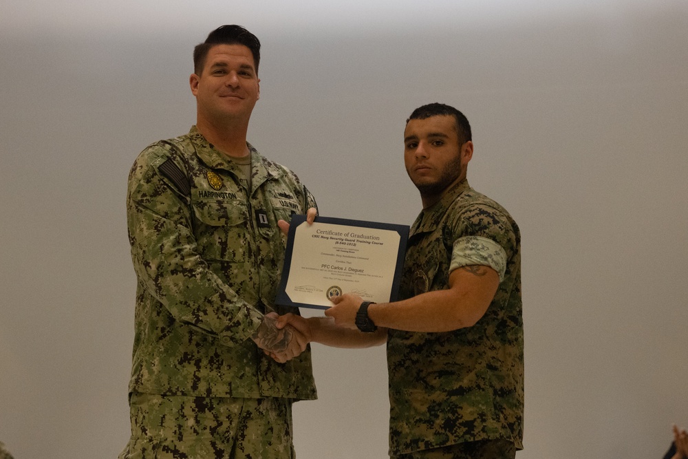 Marines, Civilians graduate Naval Security Guard Training Course