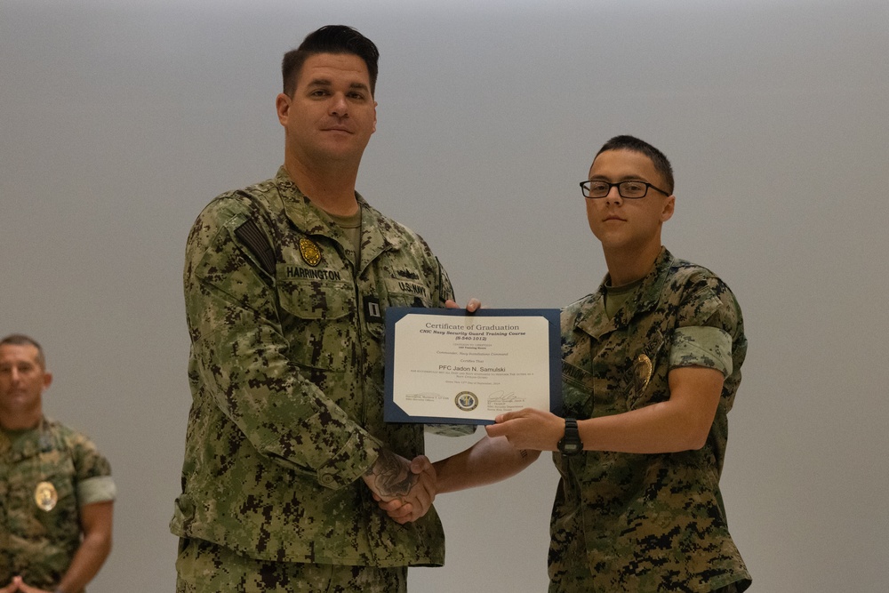 Marines, Civilians graduate Naval Security Guard Training Course