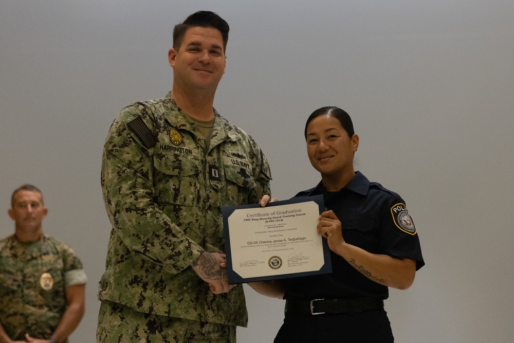 Marines, Civilians graduate Naval Security Guard Training Course