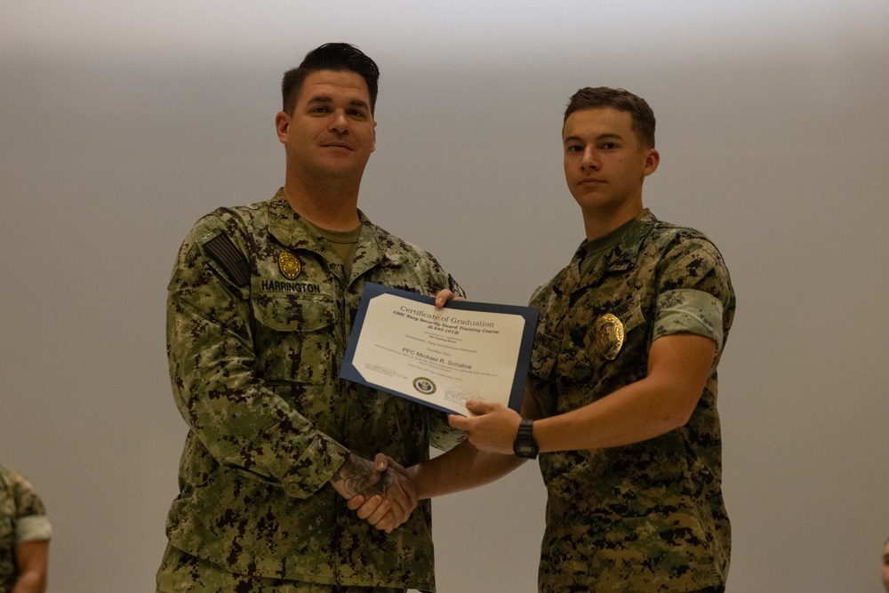 Marines, Civilians graduate Naval Security Guard Training Course