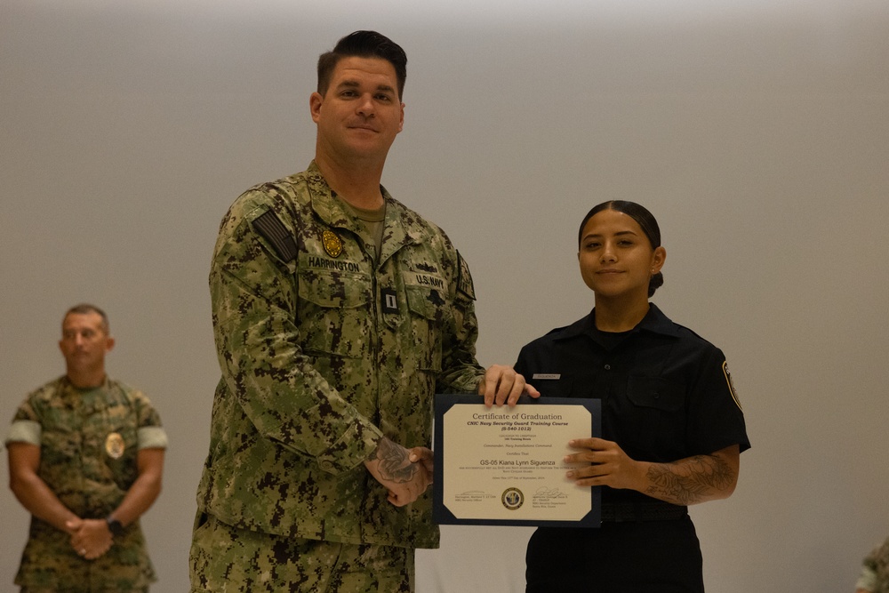 Marines, Civilians graduate Naval Security Guard Training Course