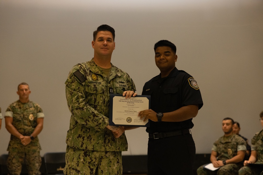 Marines, Civilians graduate Naval Security Guard Training Course