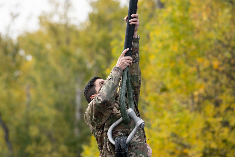 U.S. Air Force and Alaska Army National Guard conduct joint munitions sling load operations