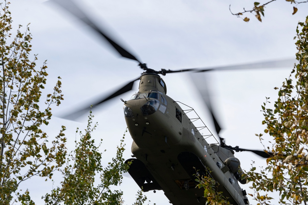 U.S. Air Force and Alaska Army National Guard conduct joint munitions sling load operations