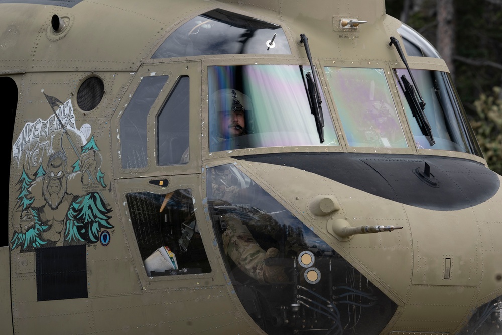 U.S. Air Force and Alaska Army National Guard conduct joint munitions sling load operations