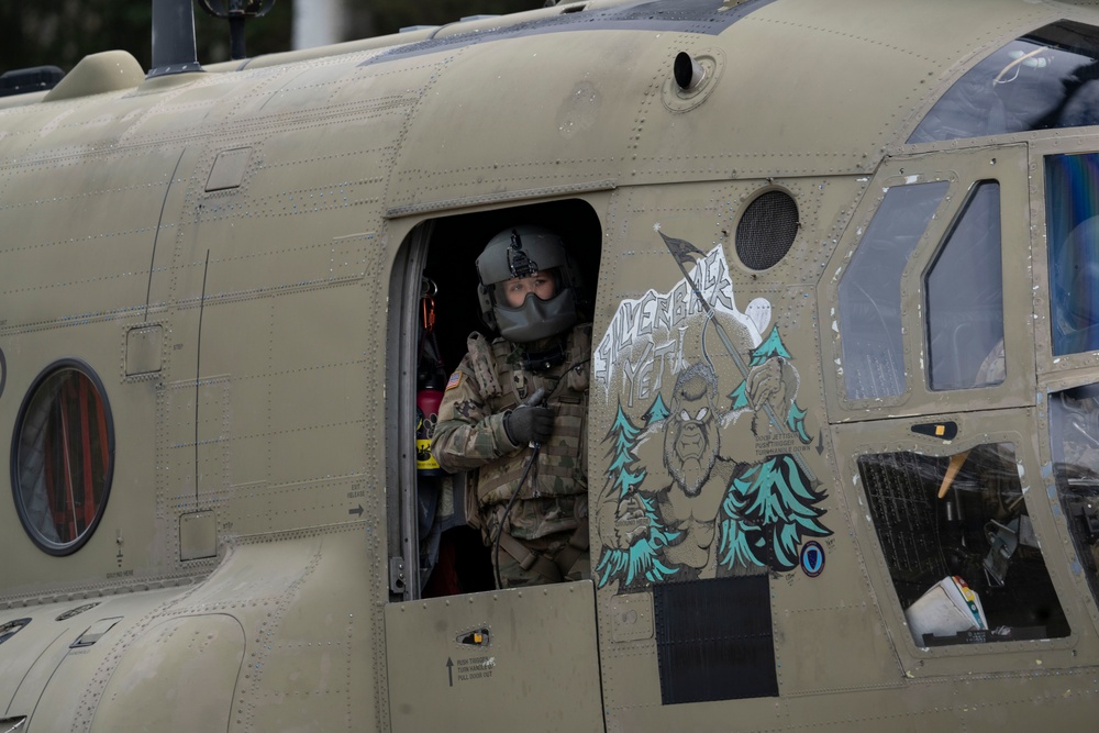 U.S. Air Force and Alaska Army National Guard conduct joint munitions sling load operations