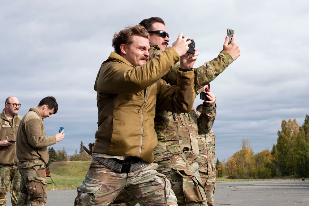 U.S. Air Force and Alaska Army National Guard conduct joint munitions sling load operations