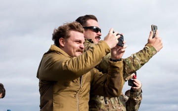 U.S. Air Force and Alaska Army National Guard conduct joint munitions sling load operations