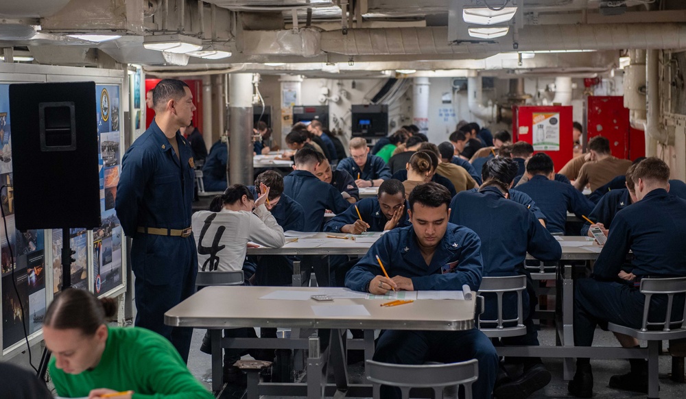 Sailors Take the E-5 NWAE Aboard Theodore Roosevelt