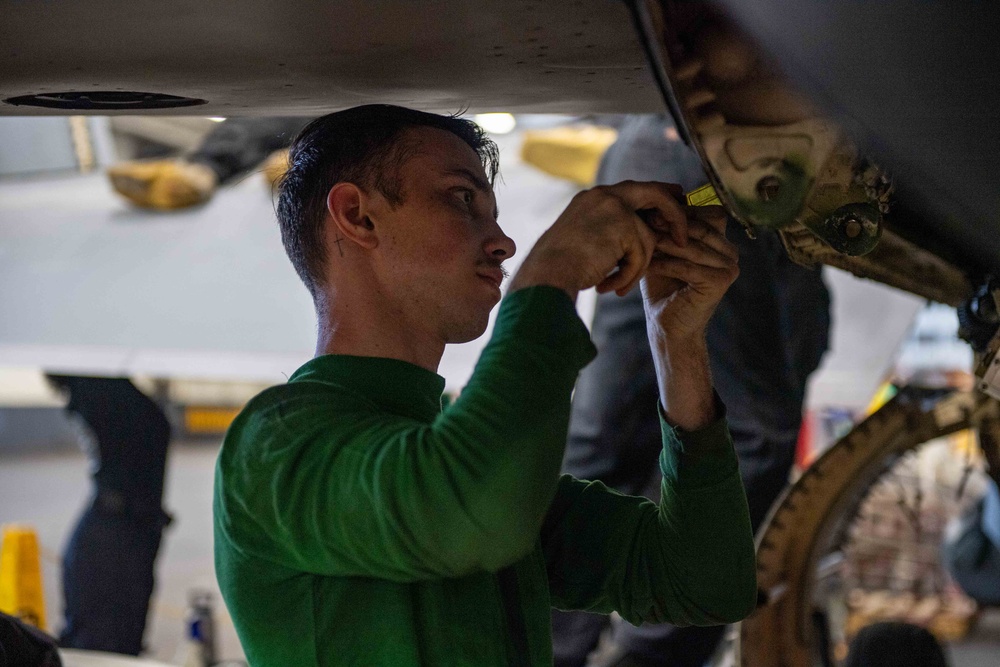 Maintaining Aircraft in Theodore Roosevelt's Hangar Bay