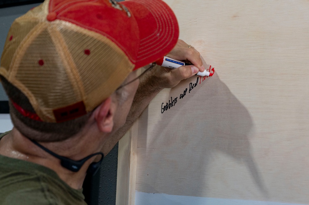 332 AEW cements history with heritage wall