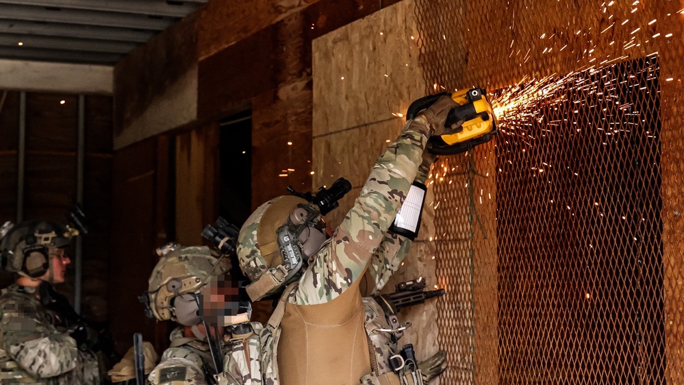 Greek partner saws through entrance