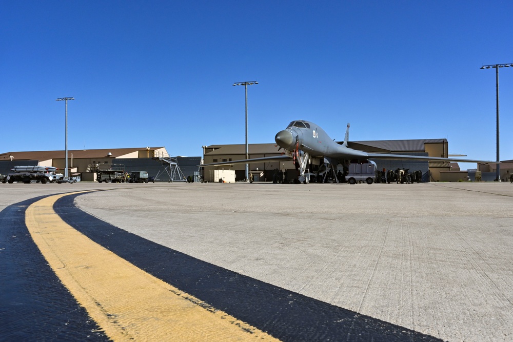 Ellsworth weapons load teams prepare B-1B Lancer during Raider Reach exercise