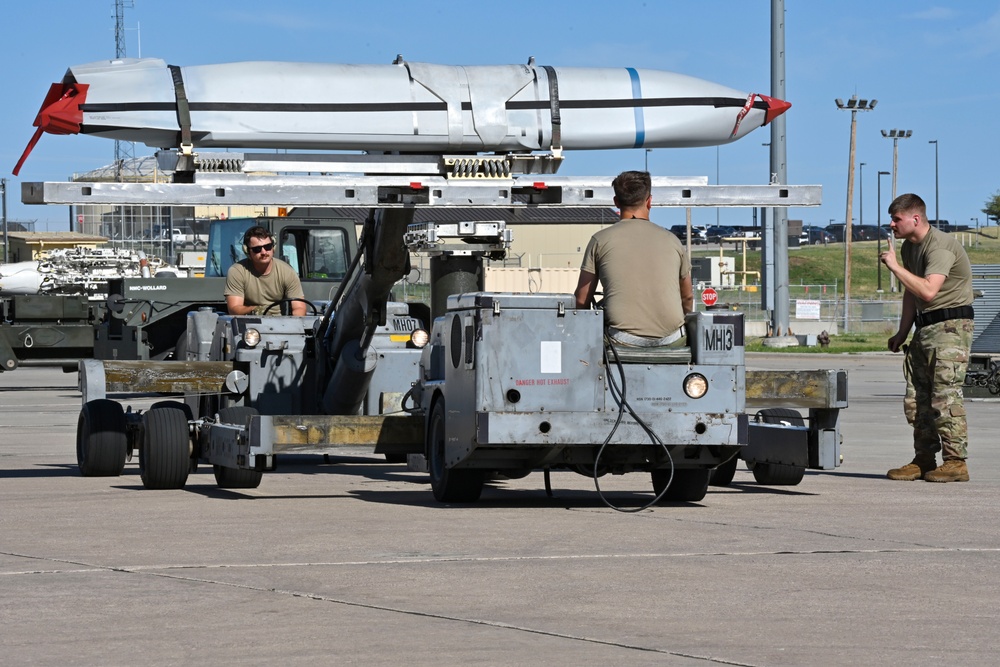 Ellsworth weapons load teams prepare B-1B Lancer during Raider Reach exercise