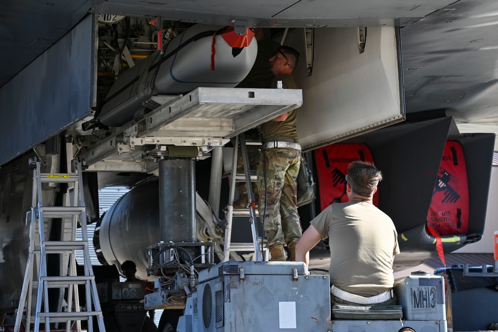 Ellsworth weapons load teams prepare B-1B Lancer during Raider Reach exercise