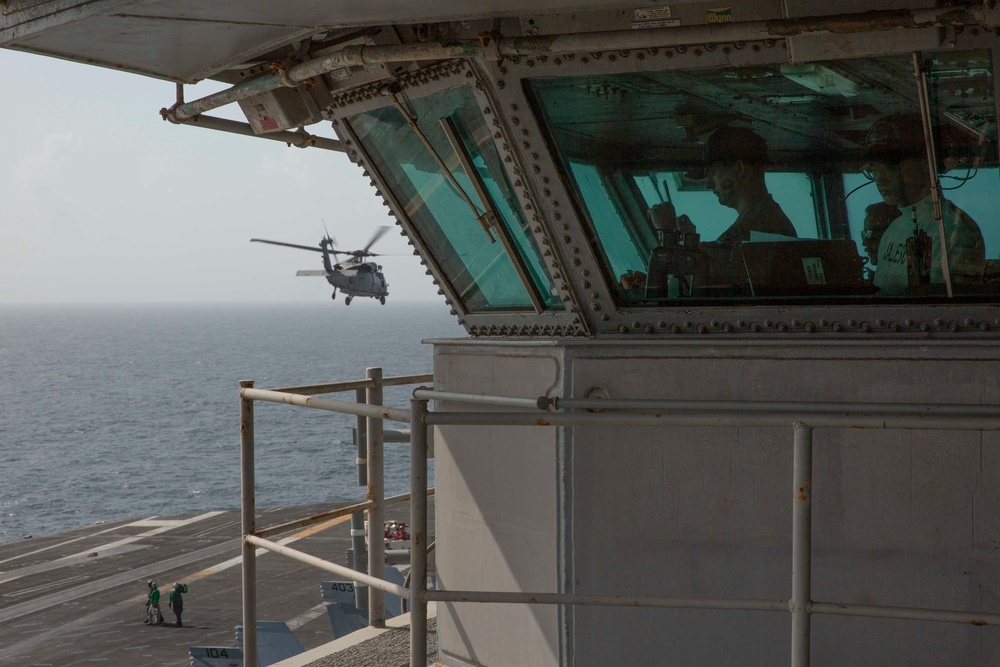 Abraham Lincoln conducts a replenishment-at-sea with Amelia Earhart