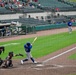 19 AW commander throws first pitch, engages with community