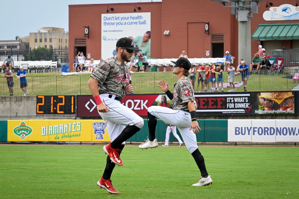 19 AW commander throws first pitch, engages with community