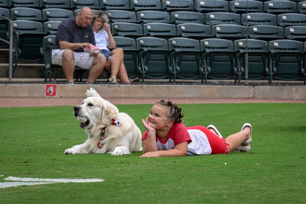 19 AW commander throws first pitch, engages with community