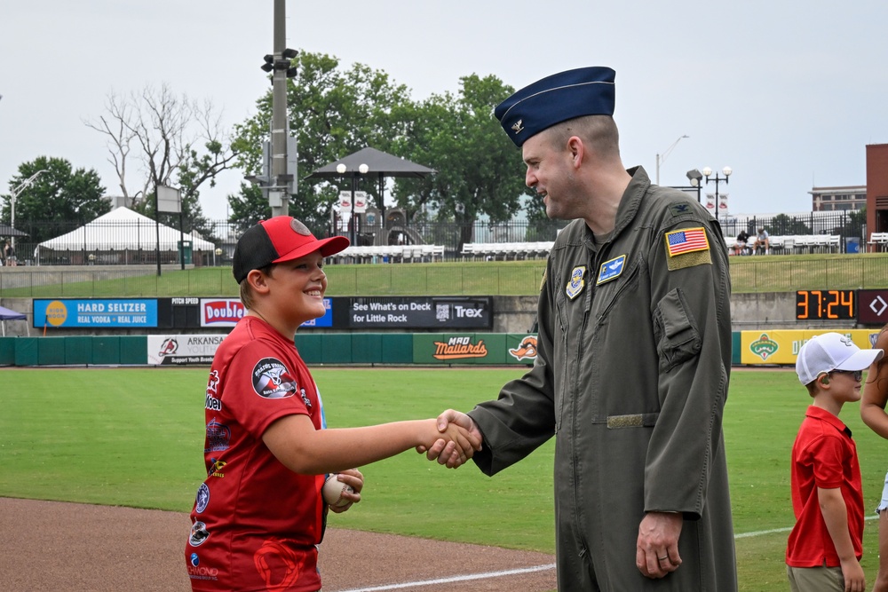 19 AW commander throws first pitch, engages with community