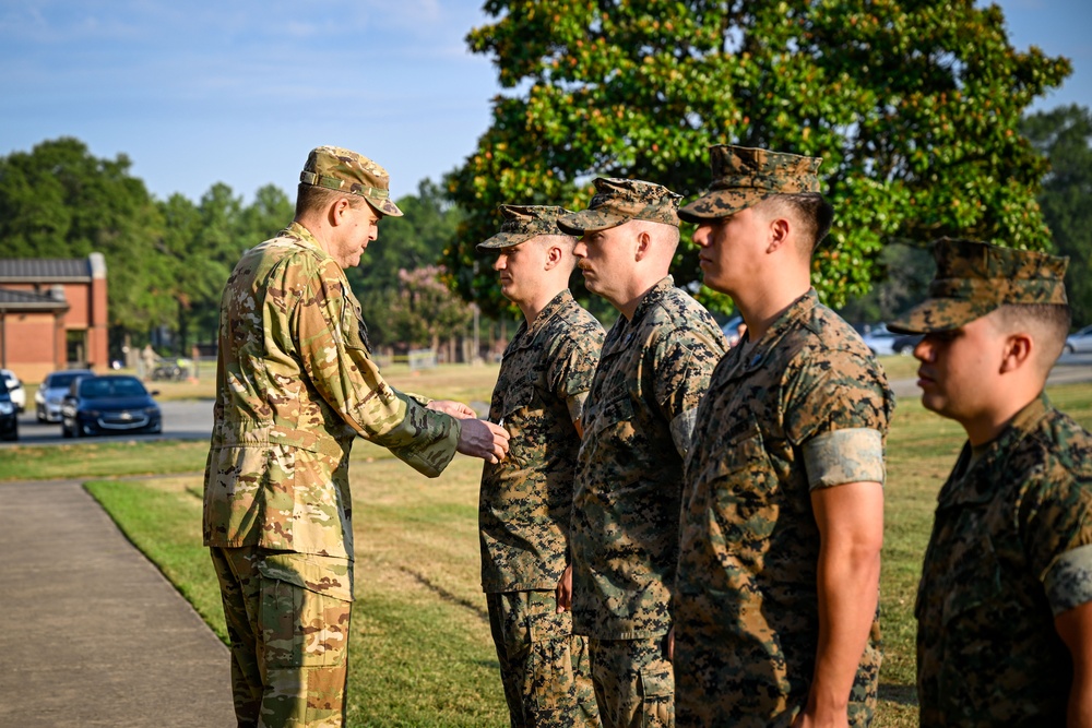 LRAFB commander recognizes Four U.S. Marines for Airmen Fitness Support