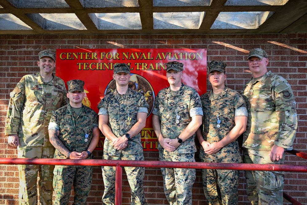 LRAFB commander recognizes Four U.S. Marines for Airmen Fitness Support