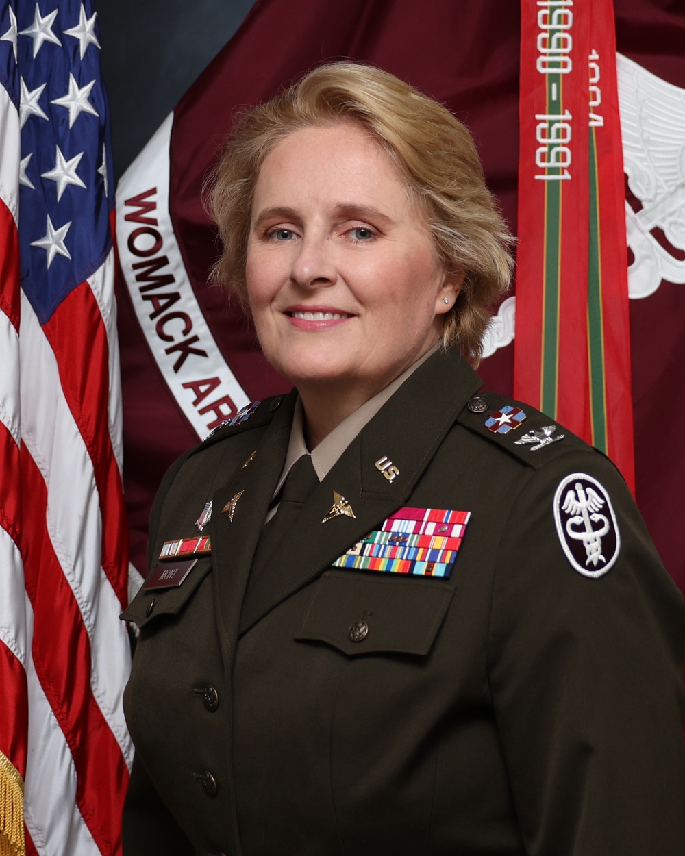 Womack welcomes new leadership, honors outgoing commander's legacy