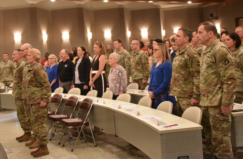 Womack welcomes new leadership, honors outgoing commander's legacy