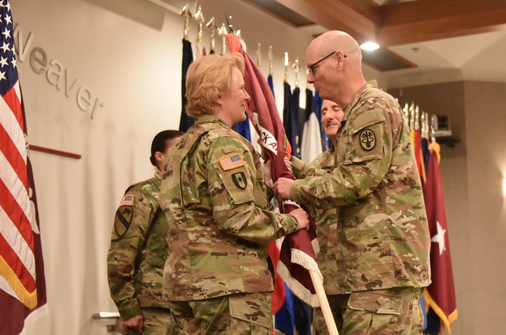 Womack welcomes new leadership, honors outgoing commander's legacy