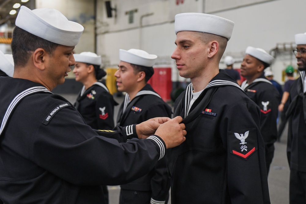 USS Ronald Reagan (CVN 76) Sailors conduct uniform inspections