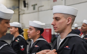 USS Ronald Reagan (CVN 76) Sailors conduct uniform inspections