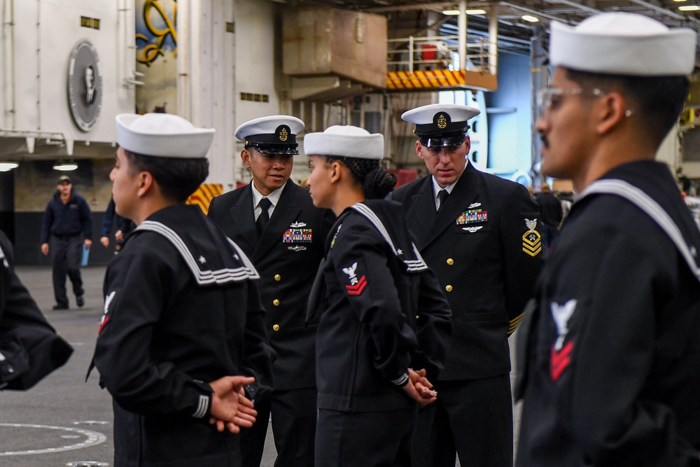 USS Ronald Reagan (CVN 76) Sailors conduct uniform inspections