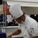 Culinary Specialist 2nd Class Larry Burns competes at the American Culinary Federation (ACF) National Convention in Phoenix, Ariz. on July 16, 2024.