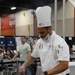 Culinary Specialist 2nd Class Larry Burns competes at the American Culinary Federation (ACF) National Convention in Phoenix, Ariz. on July 16, 2024.